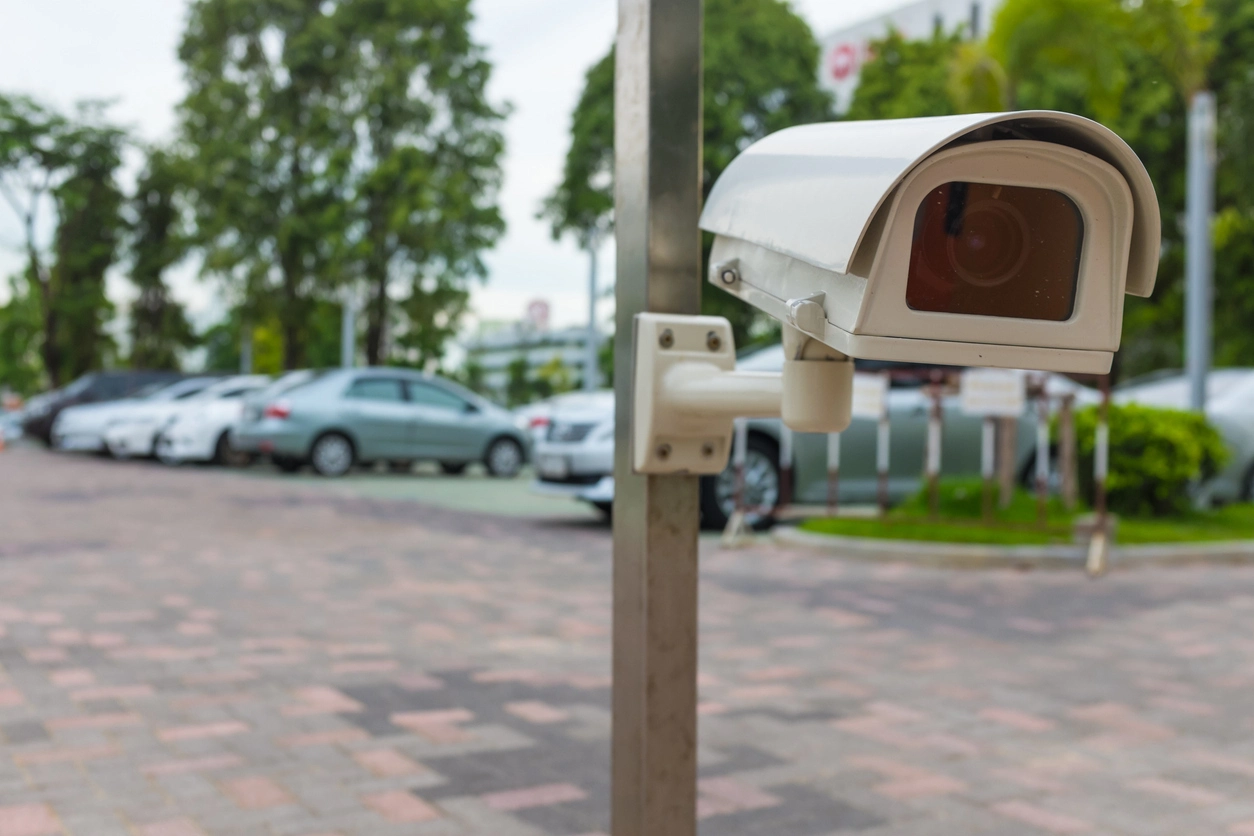 4K security camera monitoring commercial parking lot