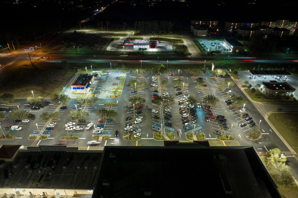 full color night vision security camera monitoring commercial parking lot at night