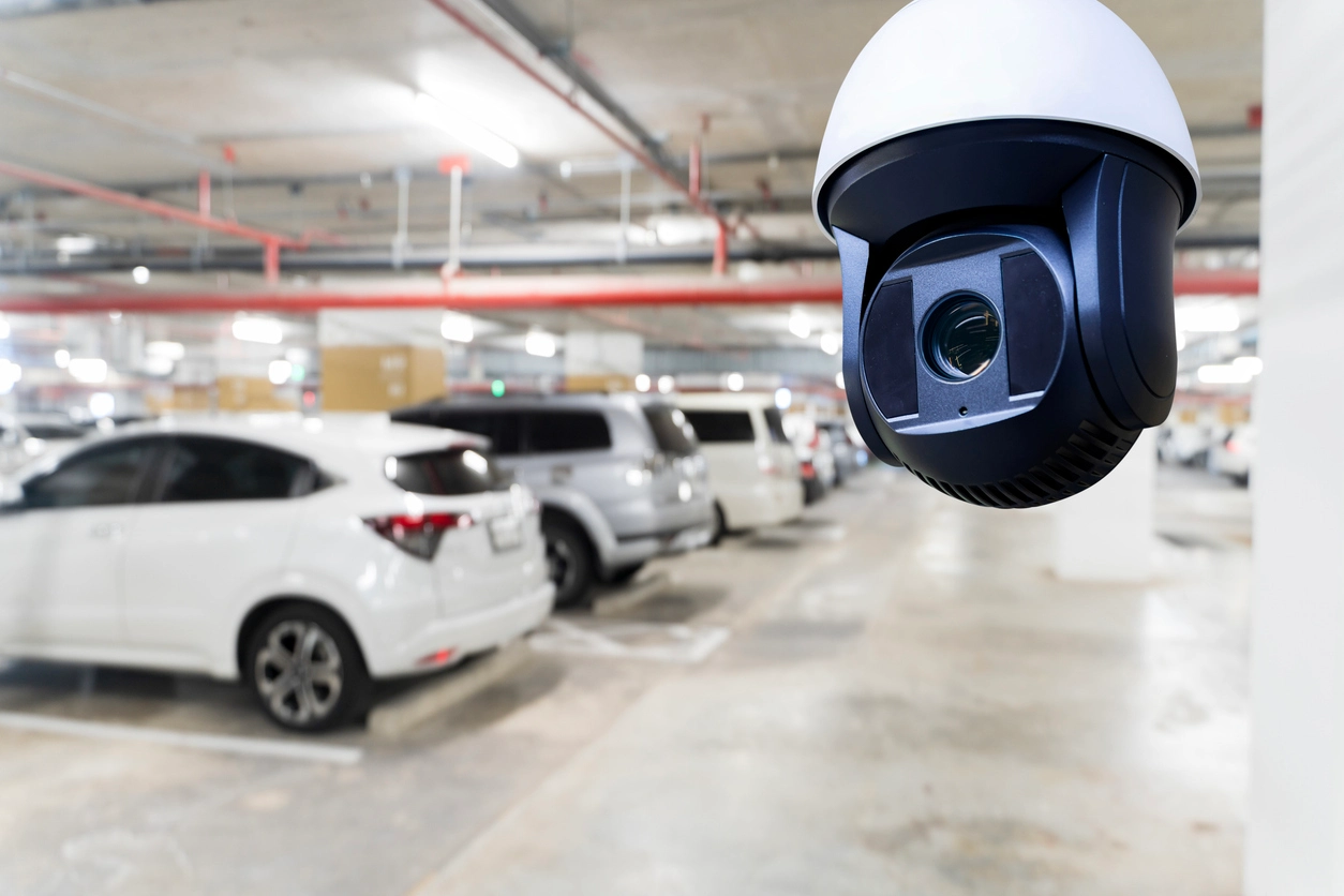 motion activated security camera monitoring commercial building entrance