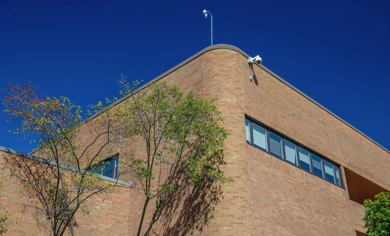 security camera monitoring courthouse public entrance and screening area