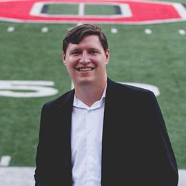 A headshot of Johnny Beagle