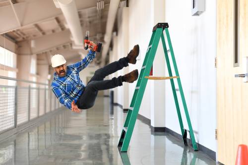 Worker falling off of a ladder